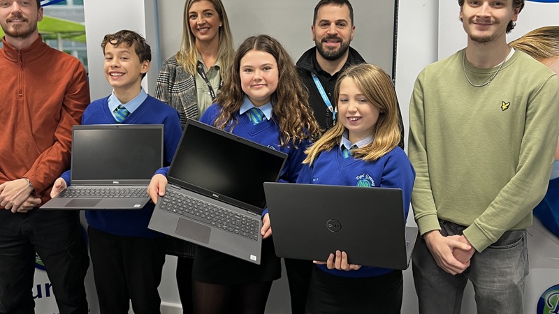 Computers being presented to Bro Dur students