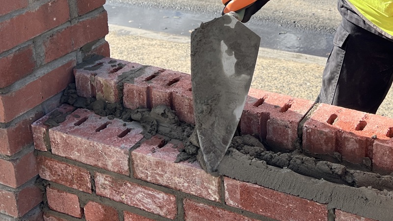 Brick wall being built