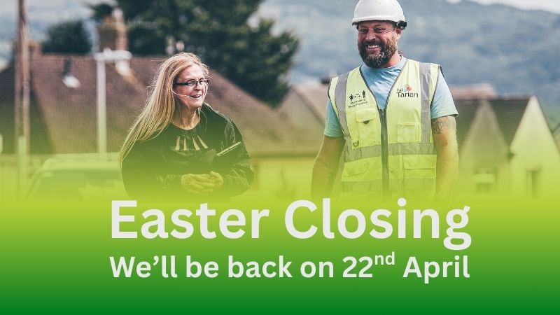 Two Tai Tarian staff members with a banner below with the headline of Easter Closing